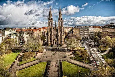 a large church with two towers in a city at Sweet Spot for 6 in Trendy Area! Family friendly! in Prague