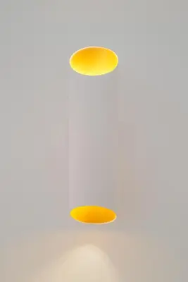 two lights on top of a white wall at Kaple Jinak in Vrchovany