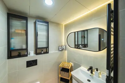 a bathroom with a sink and a mirror at Vilda's Nest by Renka & Tom in Prague