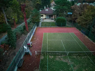 an aerial view of a tennis court in a yard at Escape to the Czech Republic in this Wonderful Tree House in Nature in Prague