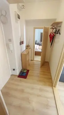 a room with a staircase and a room with a bedroom at Bright and cozy - 3 min to Old town square in Prague
