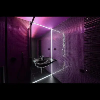 a bathroom with a sink and a purple lighting at Apartman made by David Černý in Prague