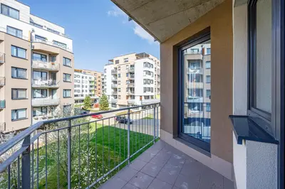 a balcony with a view of a building at New cozy apartment, Free Parking! in Prague