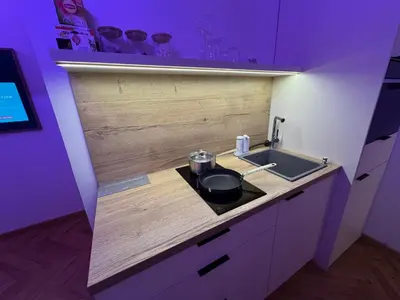 a small kitchen with a stove and a sink at LublaDeluxe in Prague