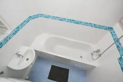 a bathroom with a sink and a bath tub at Pleasant apartment with terrace, 1 min. from metro in Prague