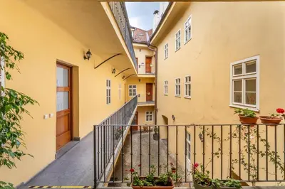 an external view of a building with a staircase at Cozy apartment in the Old town in Prague