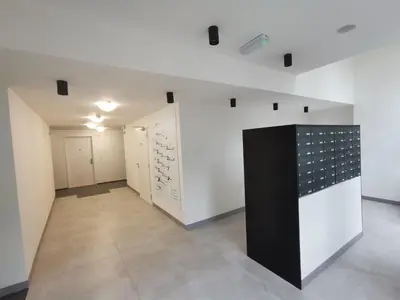 a room with white walls and a black and white wall at Glamour & Prague in Prague