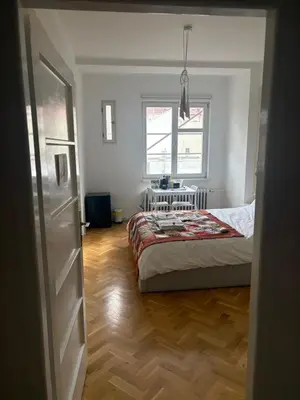 a bedroom with a bed and a window at A beautiful cozy room in Prague in Prague