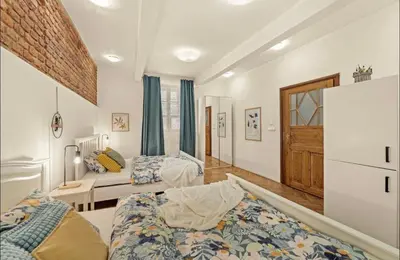 a bedroom with two beds and a window at Friendly Stay in Prague