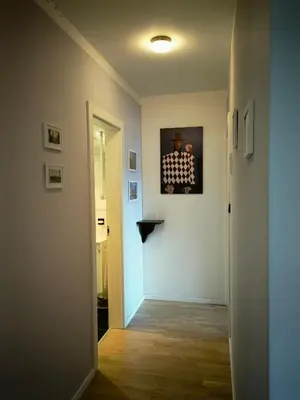 a hallway with a door leading into a room at Free Parking Modern Smíchov Apartment With Large Balcony in Prague