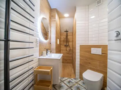 a bathroom with a toilet and a sink at Apartmán Jimi Hendrix in Nymburk
