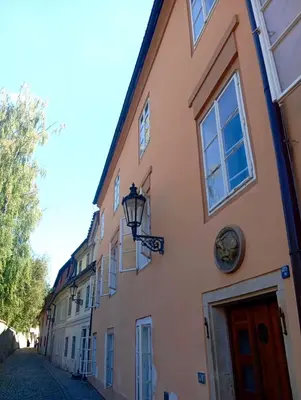 a building with a street light on the side of it at Prague centrum apartment Hradčany in Prague