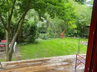 a view of a yard with a hammock at Romantic cottage Slapy - Renovated