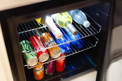 a rack in a oven filled with lots of drinks at Prague Jungle Studio in Prague