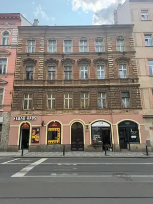 a large building on the corner of a street at Prague Jungle Studio in Prague
