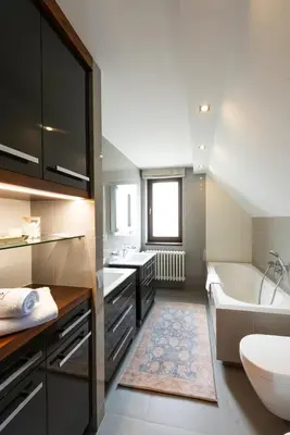 a bathroom with a sink and a tub and a toilet at Residence Sodomov