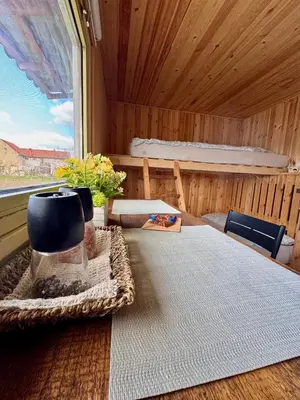 a bathroom with a shower and two toilets in it at Tiny House by the river in Litoměřice