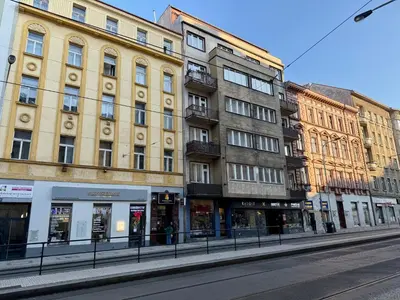 a building on a city street with buildings at PRAGUE's Hidden Pearl - center in Prague