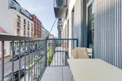an apartment balcony with a view of a street at Designer Loft Apartment Holešovice, Parking, Balcony in Prague
