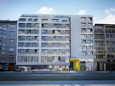 a white building with a car in front of it at Karlin Executive - Standing Desk, Monitor & Garage in Prague
