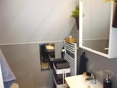 a living room with a couch and a table at Cozy Studio on Metro in Prague
