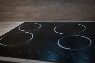 a close up of a stove top with circles on it at Apartment Spalená in Prague