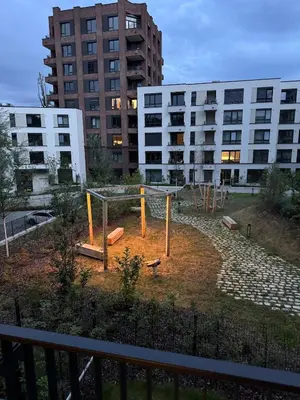 a playground in the middle of a city with buildings at Prague's Bohemian Grey in Prague