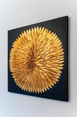 a gold flower on a black background at Big Cat Residence in Prague