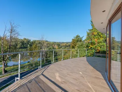 an expansive balcony with a view of the woods at Apartment U Rybníka by Interhome in Stříbrná Skalice