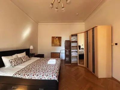 a bedroom with a large bed in a room at 1920s Charm apartment by Jerusalem Synagogue in Old Town Center in Prague