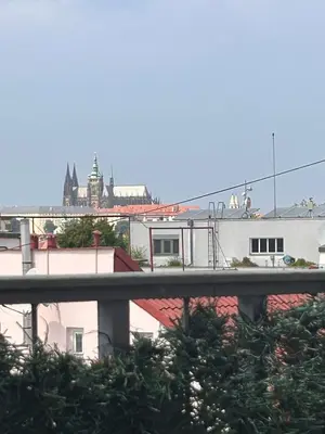 a view of a city with buildings and a bridge at Affordable Top floor 2BR nightlife location in Center and yet Quite Sleep in Prague