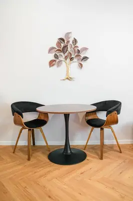 a table and two chairs in a room at LuxeLoftPrague in Prague