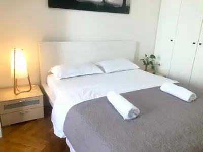 a bedroom with a bed with two pillows on it at Prague apartment in Centre city in Prague