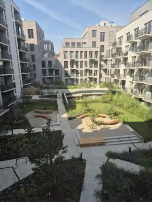 an aerial view of a courtyard in an apartment building at Smichov Luxury Apartments Residence Madeleine in Prague