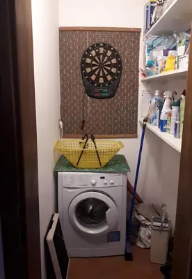 a washing machine with a sink on top of it at Chalupa u Kahounů in Popovice