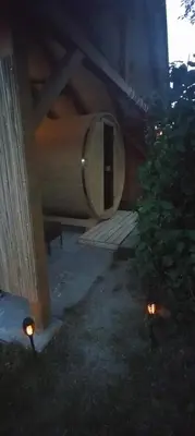 a house with two lights in the yard at Chalupa u Kahounů in Popovice