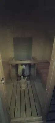 a wooden table sitting on top of a room at Chalupa u Kahounů in Popovice