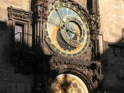 a large clock on the side of a building at City Center Deer Suite in Prague
