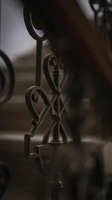 a close up of a metal rail of a table at City Center Deer Suite in Prague