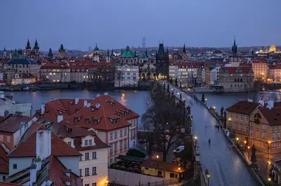 a view of a city with a river and buildings at City Center Deer Suite in Prague