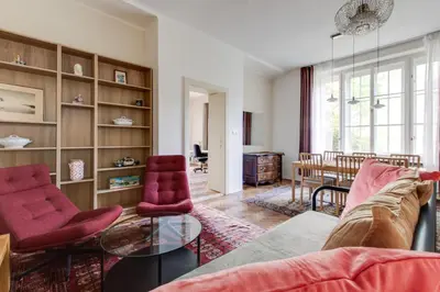 a living room with a couch and chairs and a table at Large Garden Villa Suite Business-Leisure-Sports in Prague
