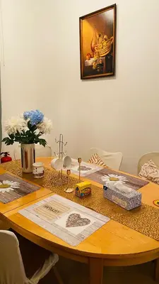 a wooden table with some items on top of it at Emperor apartment in centre in Prague
