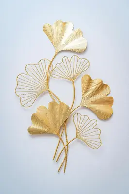 a metal ivy plant on a white background at Victory Belle Maison in Prague