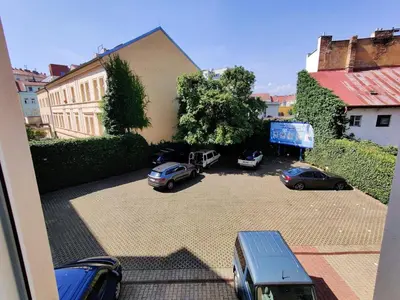 a group of cars parked in a parking lot at Comfy 2 Bedrooms Flat 4 persons & Parking in Prague