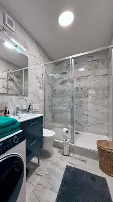 a bathroom with a tub and a sink and a shower at Mulino Apartments