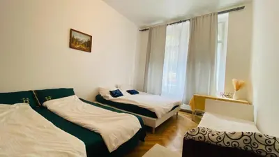a bedroom with two beds and a window at Private room in the Centre in Prague