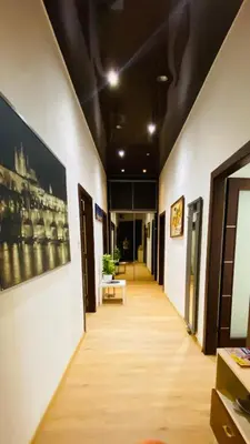 a hallway of an office building with a long corridor at Private room in the Centre in Prague