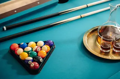 a tray of billiard balls on a pool table at Bohemia Grand Residence by Wagnerstays in Prague