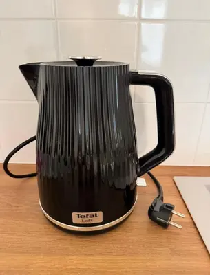 a black appliance sitting on top of a counter at Apartmán U Smaltovny 27 in Prague