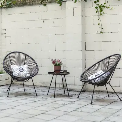 two chairs sitting next to a table with a plant at Dream Luxury Studio Prague DS1 in Prague
